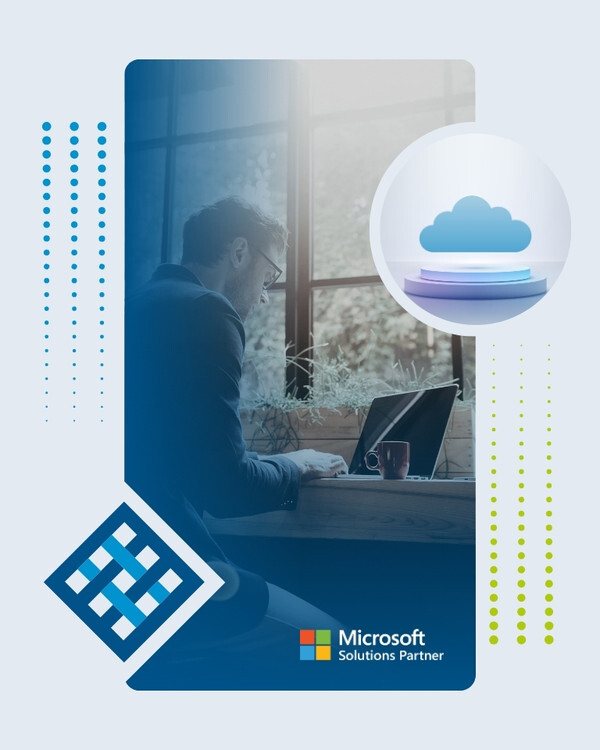 Business professional working on laptop at desk.